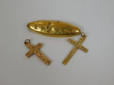 Two 9ct crucifies & a 9ct brooch