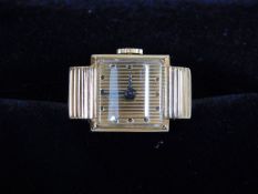 An 18ct gold Boucheron watch ring with case