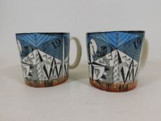 A pair of Wedgwood 1951 Festival of Britain mugs designed by Norman Makinson & decorated with Crysta