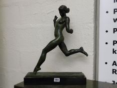 An early 20thC. bronze figure of nude woman runnin
