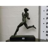 An early 20thC. bronze figure of nude woman runnin