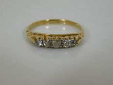 An 18ct diamond ring set with five diamonds