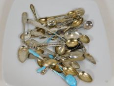 A mixed quantity of silver & white metal spoons, s
