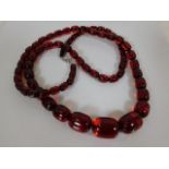 A set of antique red amber beads 94.6g