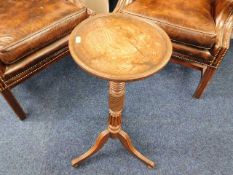A 19thC. wine table with reeded pedestal