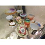 A quantity of coloured crested ware & similar item