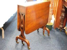 A 19thC. Holland & Sons mahogany Sutherland table