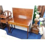 An early 19thC. mahogany card table with inlay