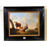 A 19thC. framed Dutch oil depicting farm woman & c