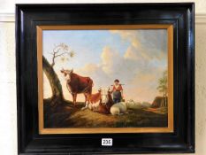 A 19thC. framed Dutch oil depicting farm woman & c