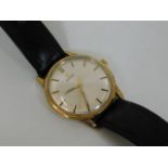 A gents 9ct gold Omega wrist watch, inscribed to r