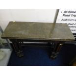 A 18thC. continental green marble topped side table supported via twelve turned pillars