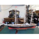 A detailed model of three rigged sail boat