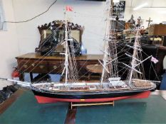 A detailed model of three rigged sail boat