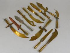 A collection of twelve brass WW1 trench art knives