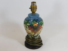 A small Moorcroft pottery lamp