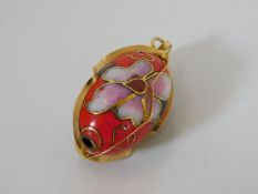 A cloisonne pendant with gold fittings