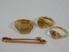 Three 9ct rings & a 9ct brooch