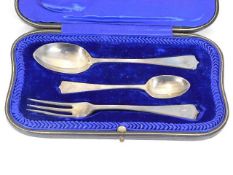 A cased silver spoon & fork set
