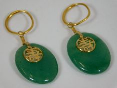 A set of Chinese jade earrings mounted with fine g