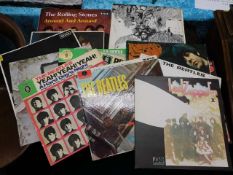 A quantity of vinyl LP's including Beatles, Rollin