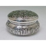 Late 19th/early 20th Century French silver circular box and cover having allover foliate