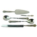 Silver handled salad servers, carving knife, cake slice and nail file Condition: