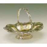 19th Century silver plated oval cake basket having embossed foliate decoration, swing handle and