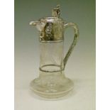 Victorian finely engraved glass baluster shaped claret jug, the embossed silver mounts with rubbed