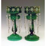 Pair of late 19th/early 20th Century green glass lustre drop vases, each having foliate decoration