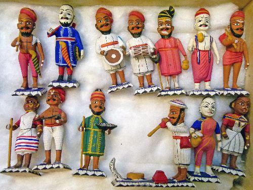 Collection of mid 20th Century Indian polychrome decorated carved wooden figures of characters
