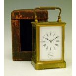 Large early 20th Century French brass cased carriage clock, the white enamel dial with Roman numeral