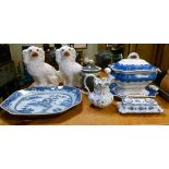 Two Staffordshire comforter spaniels, a blue and white Chinese export meat plate, a pottery tureen