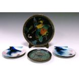 Two late 19th Century Japanese cloisonné circular dishes, each decorated with stylised foliage,