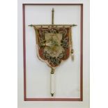 Victorian beadwork and petit-point banner screen in a glazed display frame Condition: