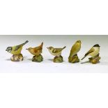 Five Royal Worcester bisque porcelain bird ornaments - Wood Warbler, Gold Crest, Wren, Marsh Tit and