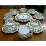 Foley China tea service having foliate decoration on a green and off-white ground Condition: