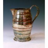 Early 19th Century Sheffield plate barrel shaped jug, the intertwined reeded handle with foliate