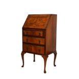 Early 20th Century walnut bureau fitted three drawers, cabriole supports Condition: