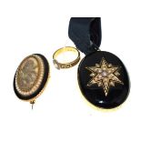 Mourning Jewellery - Victorian oval gilt metal black enamelled locket having seed pearl set star, an