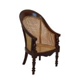 Late 19th/early 20th Century child's mahogany framed bergere style armchair having canes seat and