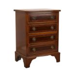 Reproduction mahogany string inlaid chest of four drawers Condition: