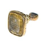 Gold coloured metal fob seal having rectangular engraved crest with motto Condition: