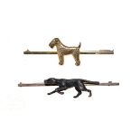 Two bar brooches, each set with a dog, both stamped '9ct' Condition: