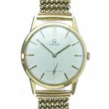 Omega - Gentleman's wristwatch, the signed gold on steel case having an off-white dial with gold