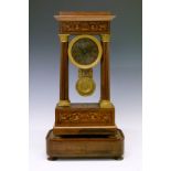 19th Century inlaid rosewood portico clock, silvered dial with Roman numerals, grid-iron pendulum,