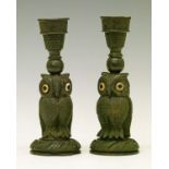 Pair of 19th Century Irish carved bog oak figural candlesticks, each formed as an owl having glass