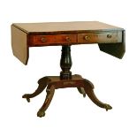 Regency inlaid and crossbanded rosewood two flap sofa table, the flaps with canted corners, fitted