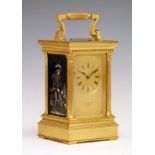 Large satin brass cased repeat carriage clock, gilt dial having Roman numerals and set within a