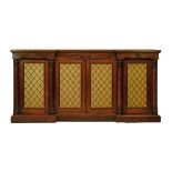 Victorian rosewood inverted breakfront credenza, the frieze with moulded scroll work, four doors